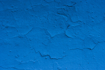 An old, worn concrete wall with slight cracks.