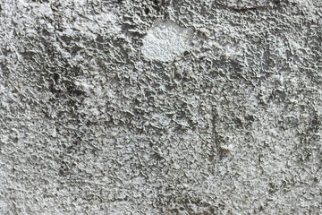 Old rough concrete grey wall.
