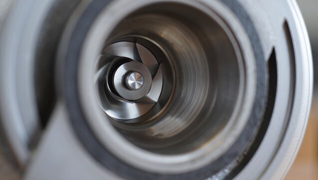 Close up of a stainless steel impeller pump providing efficient fluid transfer solution for industrial applications and engineering innovation with precision design
