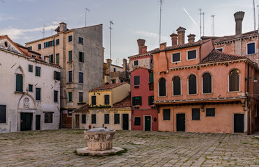 Colorful historic houses in a Venetian square Italy