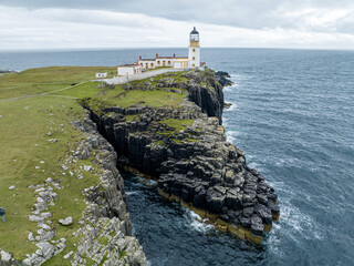 Aerial view of Neist Point, a promontory on the Isle of Skye, Scotland, famous for its lighthouse and sheer cliffs. UK