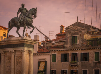 Bronze equestrian statue of Venetian commander at sunset