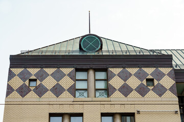 Colonial building with copper roof and tile wall, Toronto, Canada
