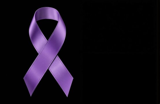 Purple awareness ribbon on black background with ample copy space. Support for various causes like epilepsy, Alzheimer, cancer, domestic violence awareness. Used for health campaigns, fundraising