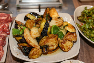 Stir-fried Potatoes, Eggplant, and Peppers. Chinese food