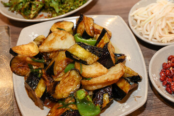 Stir-fried Potatoes, Eggplant, and Peppers. Chinese food