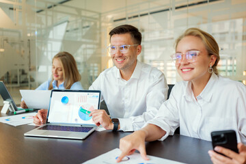 Dynamic teamwork in a modern office environment with engaging discussions and creative strategies being shared