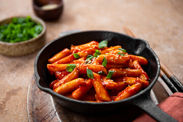 Korean street food, tteokbokki with sesame in the fried pan