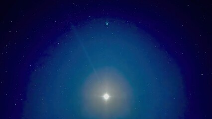 glowing moon halo with radiant starlit sky and cosmic aura perfect for astronomy poster or mystical background