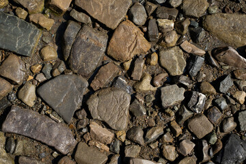 Group of stones close-up. Background of building material, decorative stone.
