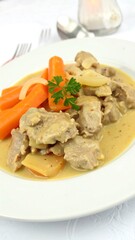 Creamy beef stew with carrots