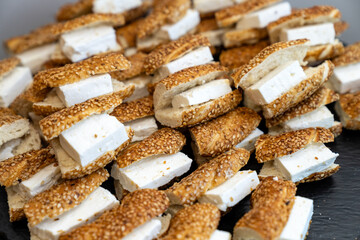 coffee break hotel during conference meeting, corporate revent with tea and coffee catering, decorated catering banquet table with variety of different pastry and bakery, with croissants and cookies