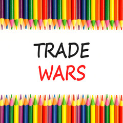 Trade wars symbol. Concept word Trade wars on beautiful white paper. Colored pencils. Beautiful white paper background. Business trade wars concept. Copy space.