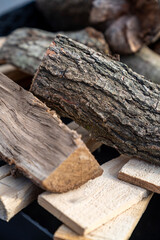 Close up of firewood logs with natural bark texture, rustic wooden background, winter heating material, chopped timber stack, sustainable forestry, organic fuel source, eco-friendly wood energy