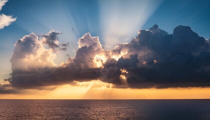 sunlight breaking through dramatic cloud formation