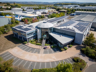 Modern industrial estate with warehouses, logistics distribution hub, business park offices and...