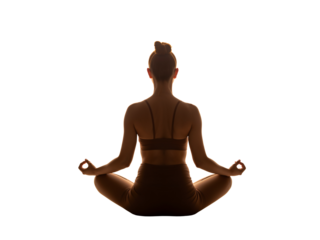 Serene silhouette of a woman in lotus position symbolizing mindfulness and tranquility on