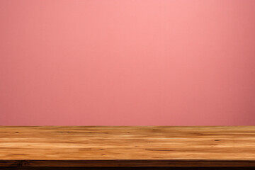 Empty wooden table top and color pink wall background for showing products and advertisers. Template mock up for display of product. product promotion in the wall. for display or montage.