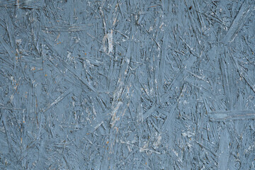 Painted oriented strand board texture in blue
