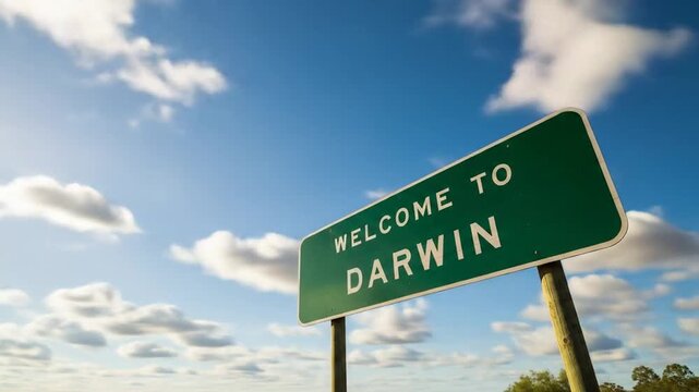 Driving towards darwin: A road sign under a bright blue sky in Australia