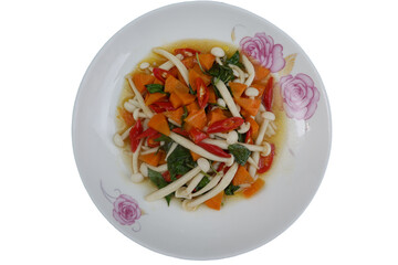 Stir-fried mushrooms with basil Delicious stir fried carrot, mushroom, chili and basil is ready for eating. Looks a vegetarian dish