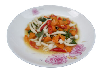 Stir-fried mushrooms with basil Mushroom and vegetable stir fry present tantalizing and healthy meal option. a vegetarian dish