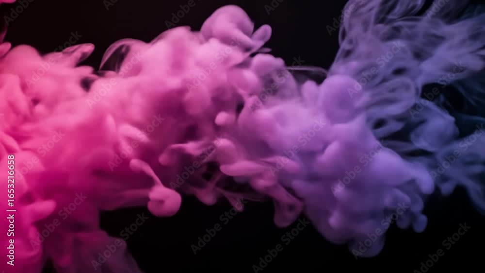 Poster pink and purple smoke billowing against a dark background creating an abstract cloud effect visual