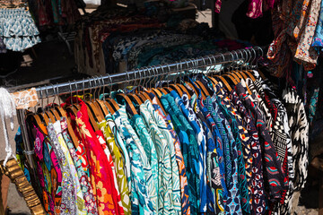 colorful vintage clothings on fashion flea market - second hand clothes ,