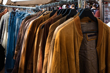 second hand leather jackets on vintage clothing flea market ,