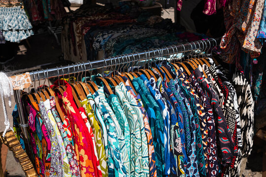 colorful vintage clothings on fashion flea market - second hand clothes ,