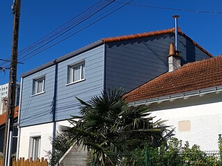 Surélévation maison de toiture en tuiles