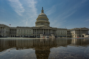 Fototapeta premium Capitol Building. Historic symbol of American democracy. United States Congress in Washington, DC. The Capitol dome over Capitol Hill. Federal government in the nation's capital.