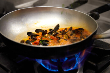 Flambéing Pan with Seafood Spaghetti
