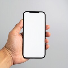 Close-up shot of a hand holding a smartphone with blank screen for mockup