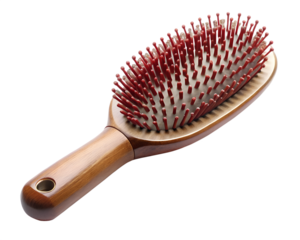 Wooden hairbrush with red bristles, isolated on transparent background