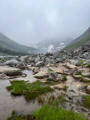 Rain over Bebel Creek in Consolation Lakes valley, Banff NP, Canada
