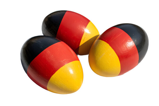 Ostereier in den Farben der deutschen Flagge, stilvoll bemalt in Schwarz, Rot und Gold, symbolisieren nationale Verbundenheit und kreative Osterdekoration 