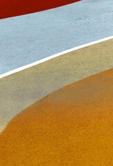 Abstract rubber surface. Vibrant trendy texture with yellow, beige, blue, red painted geometric