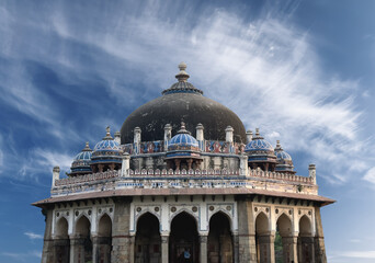 Fototapeta premium Historic tomb of Isa Khan. Indian 16th century mausoleum, Indo Islamic architecture with large dome,