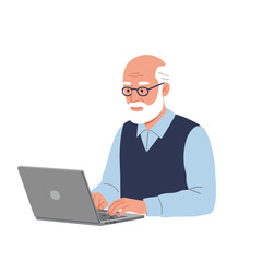 An older man with white hair and beard working on a laptop computer