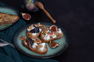 Healthy Snack Three Toasts with Figs Goat Cheese and Honey