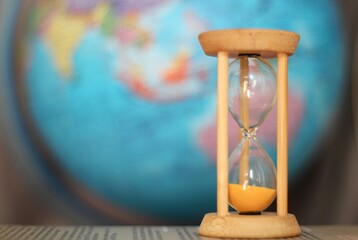 Hourglass and the globe time travel distance symbols