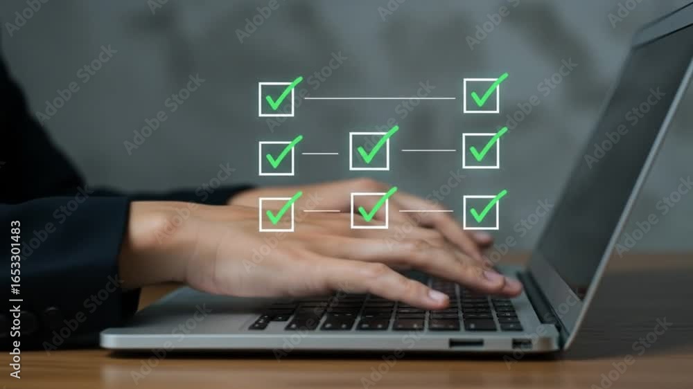 Poster person typing on a laptop with green checkmarks in boxes overlaid on the screen and connected by lin