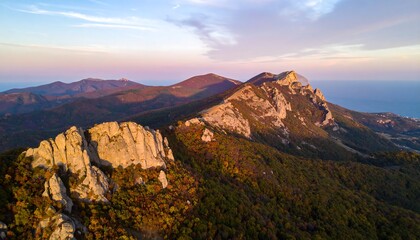 Autumnal mountain range panorama at sunset