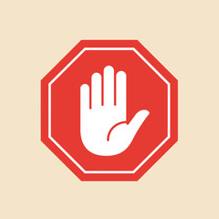 Octagonal red sign with white hand gesture on beige background
