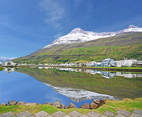 Beautiful Icelandic fjord and village of Seydisfjordur on a sunny day.