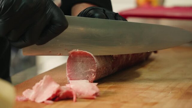 Raw frozen meat with cheese, capers and lemon. Stroganina siberian beef dish, depp frozen russian traditional food. 