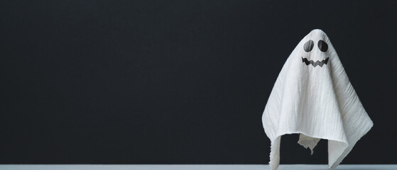 Dark Minimal Halloween Background with Ghost Decoration