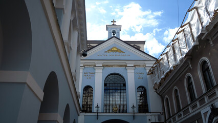 Obraz premium Vilnius, Lithuania. The Gate of Dawn is a city gate and one of its most important religious, historical and cultural monuments. It is a major site of Catholic pilgrimage in Lithuania.