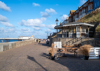 Sunny afternoon on the promenade in the seaside town of Cromer, Norfolk coast